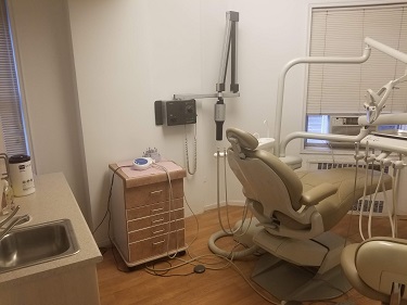 dental chair in operatory with equipment